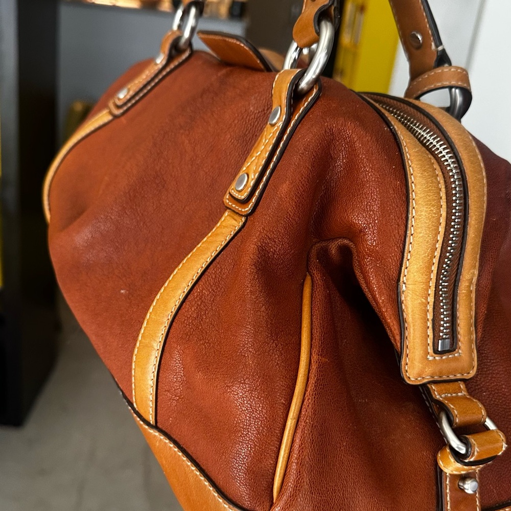 Cole Haan Deluxe Handbag – Effortlessly Chic, Forever Classic! Grab yours Today
